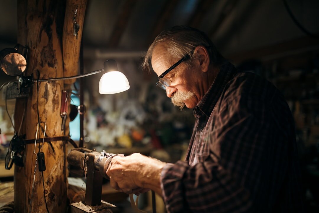 Danish carpenter working with wood in a small workshop