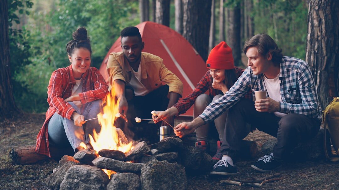 group of friends around campfire