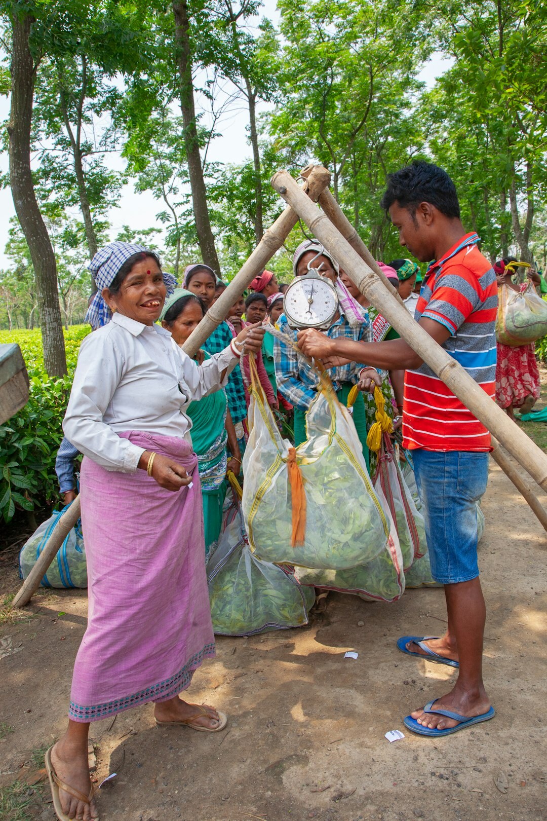 mothers and children in community garden