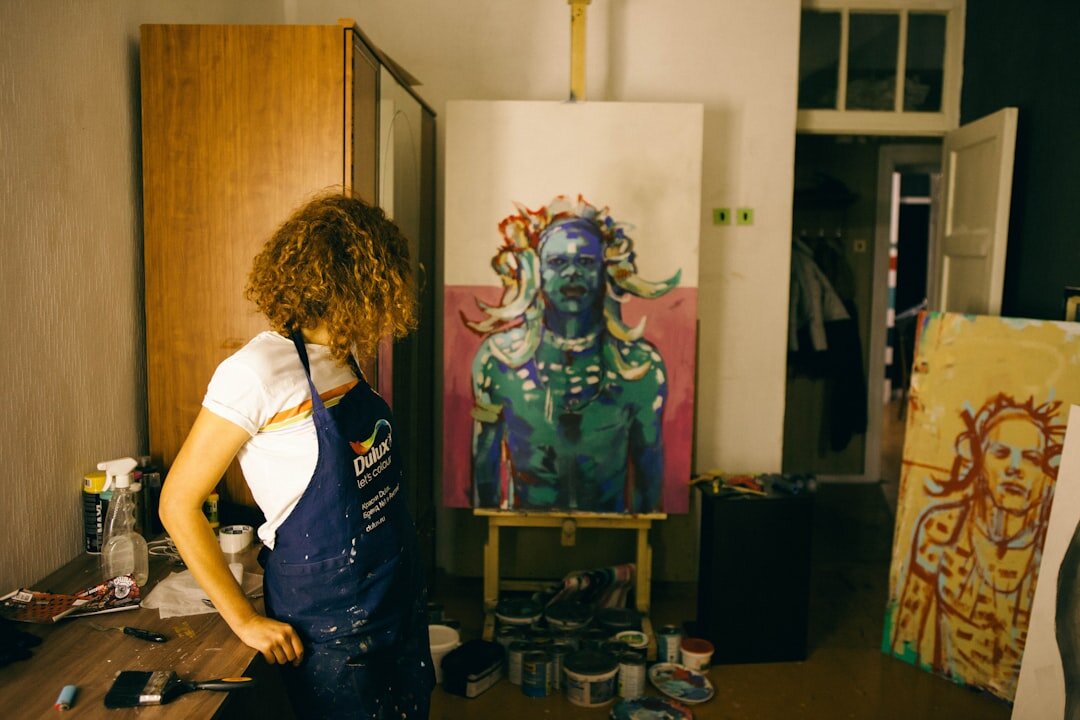 artist painting in studio